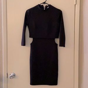 Cute black bodycon dress with side cut outs!